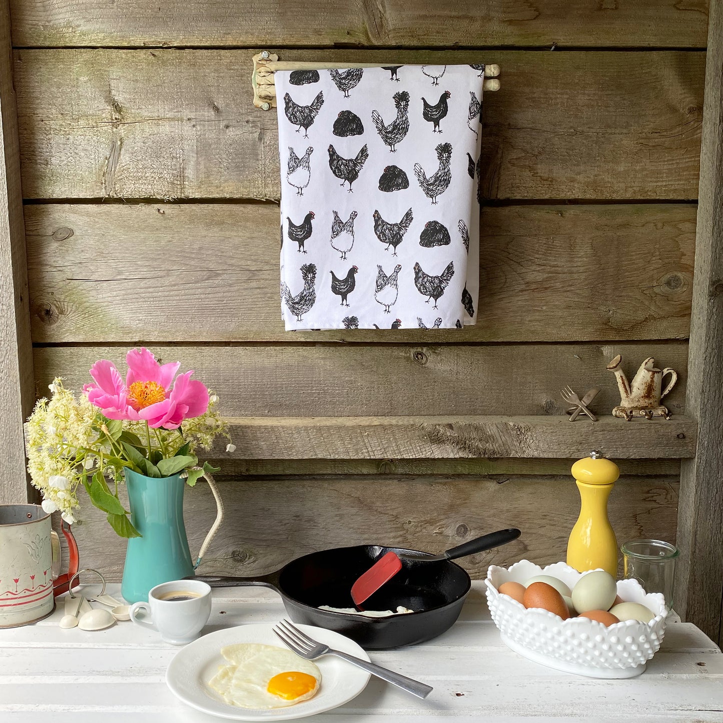 Chicken themed cotton tea towel with hand-drawn chickens, ethically made in USA.