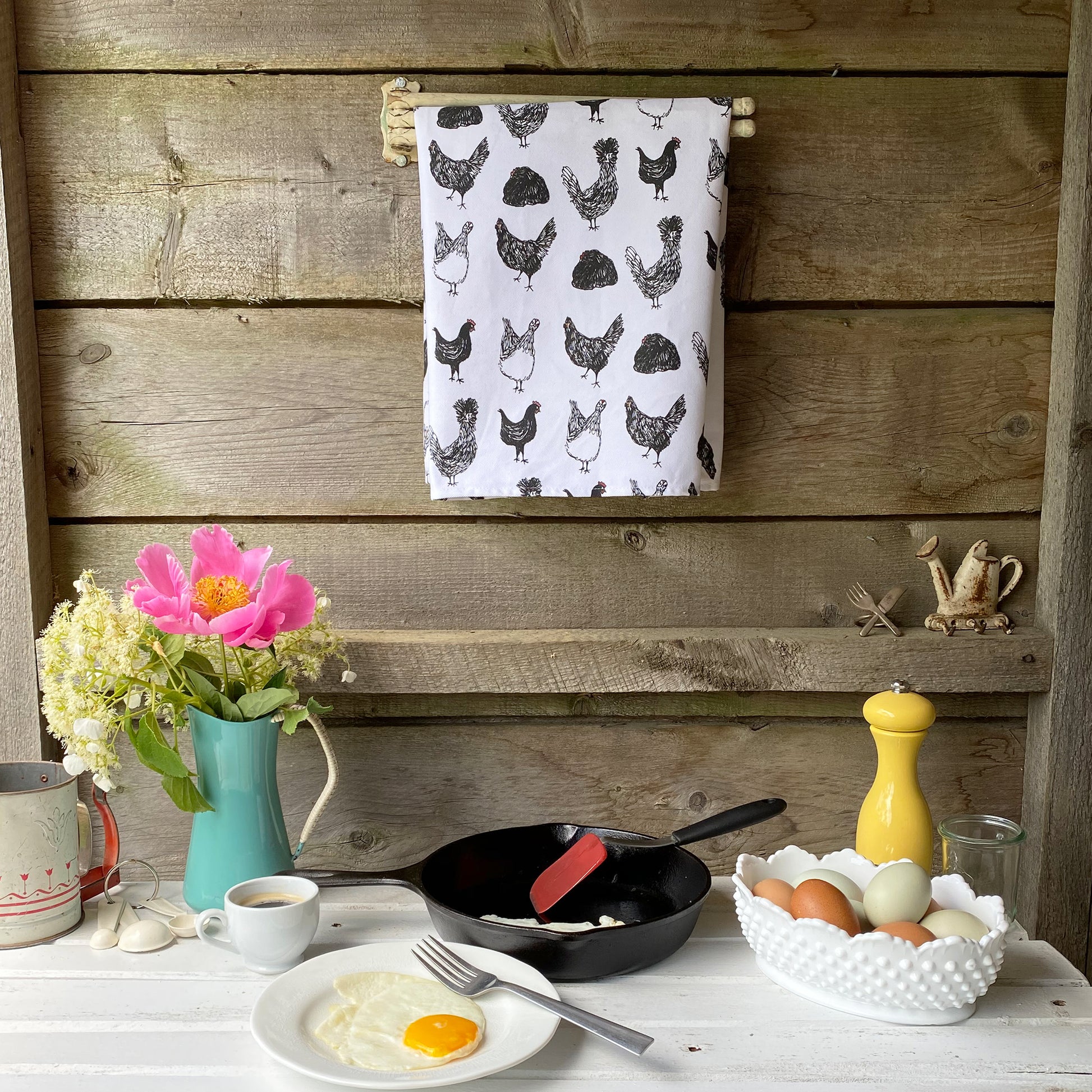 Chicken themed cotton tea towel with hand-drawn chickens, ethically made in USA.
