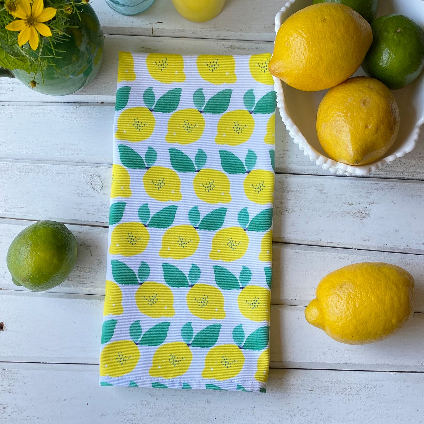 Lemon themed cotton tea towel with watercolor lemons, ethically made in USA