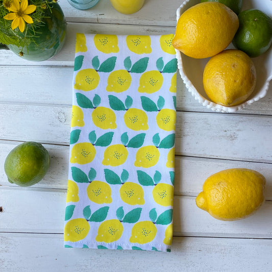 Lemon themed cotton tea towel with watercolor lemons, ethically made in USA
