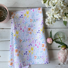 100% cotton tea towel with a cheery painted yellow tulip garden flower pattern by Amy McCoy