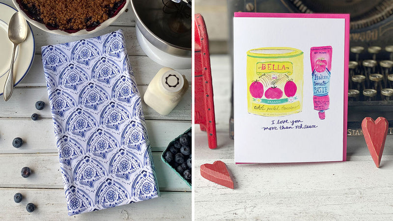 a blue and white tea towel and a greeting card with a painting of a tomato can and tomato paste with hand lettered "I love you more than red sauce" on the front